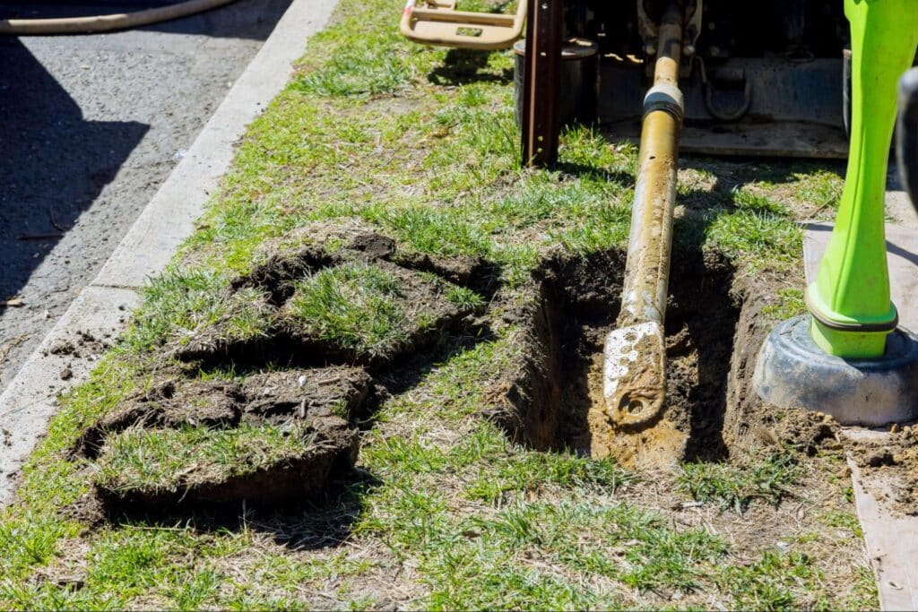 Excavation site showing a trenchless pipe repair dig.