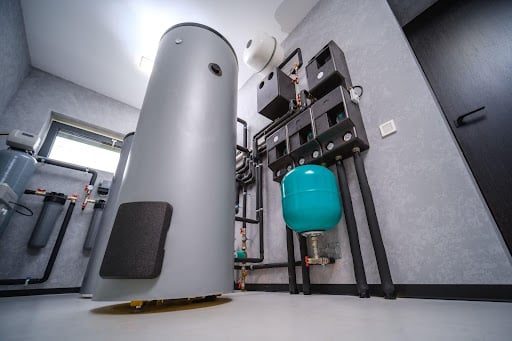 Modern water heater setup in a compact utility room with efficient systems.
