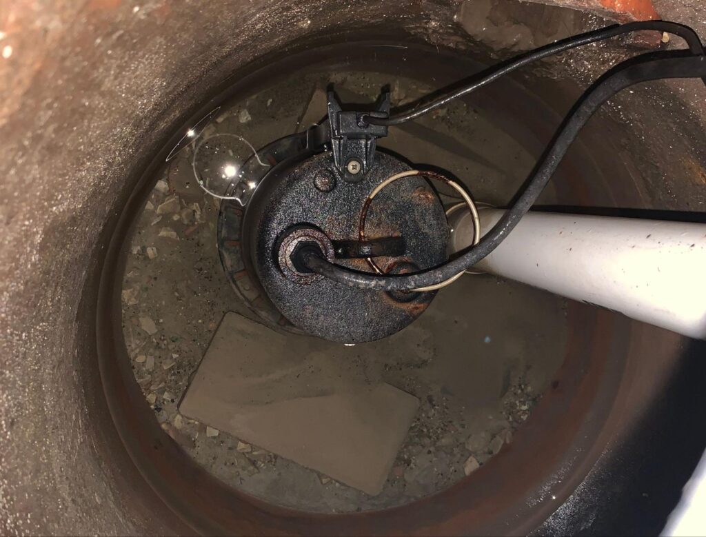 Sump pump interior view showcasing components for effective water drainage management.