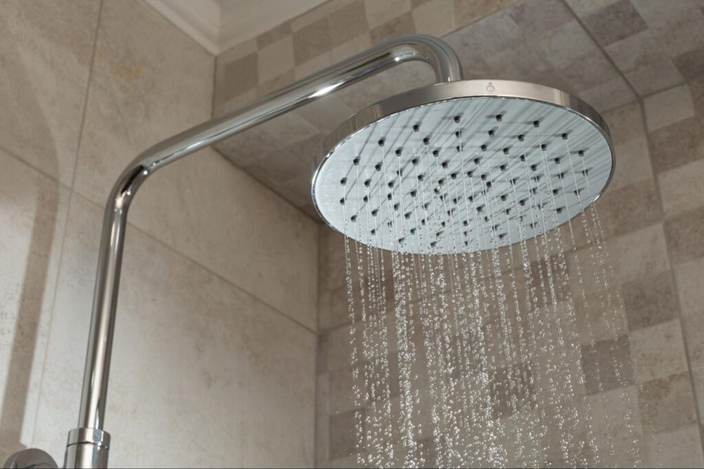 Modern chrome showerhead for a revitalizing and luxurious shower experience.